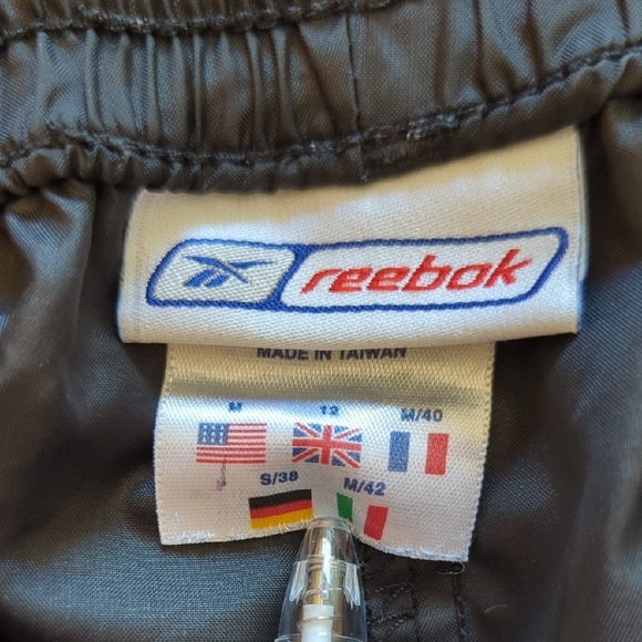 90s/Y2K Reebok Women's Black Swishy Winderbraker Pants with White Pinstripe - Picture 2 of 9